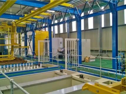 E Coat Plant showing tanks, carriers, control panels and services.